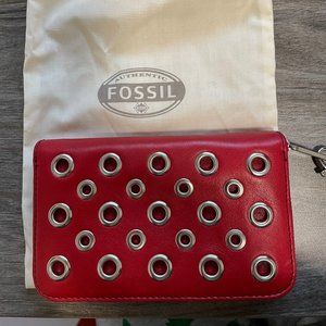 Fossil red leather, zip-arou wallet/wristlet with stainless-steel grommet detail